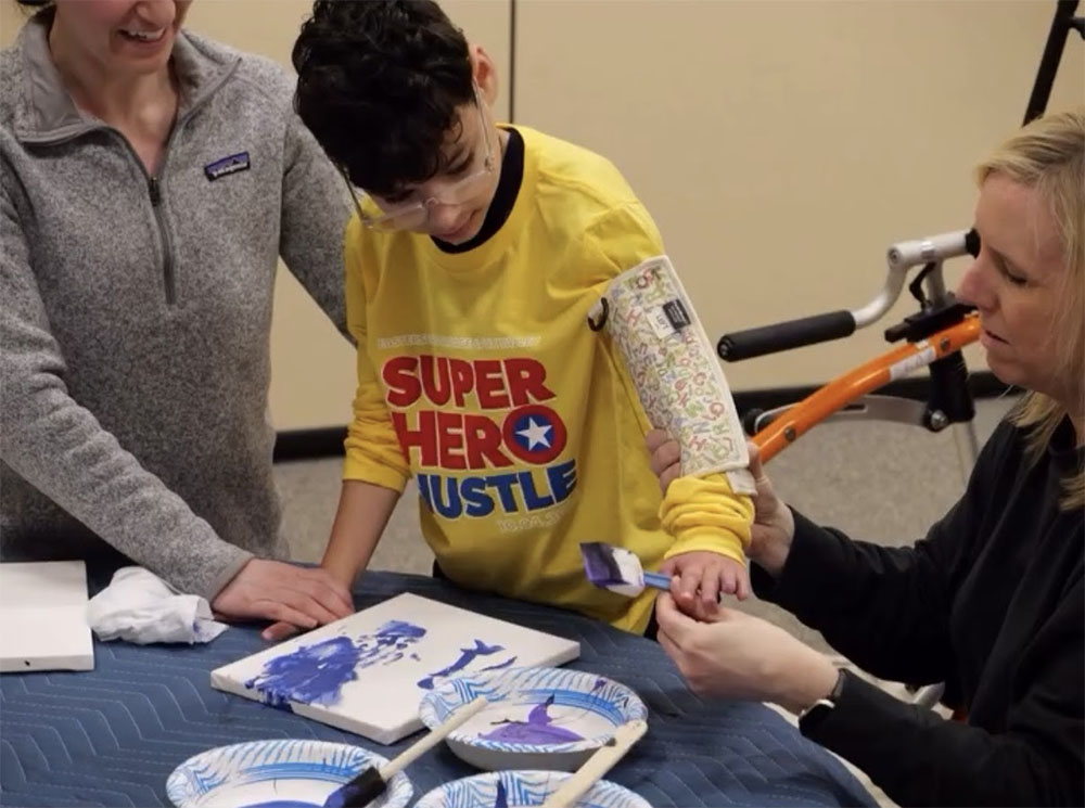 Easter Seals Painting in Action